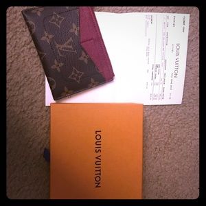 Louis Vuitton card holder in fuchsia